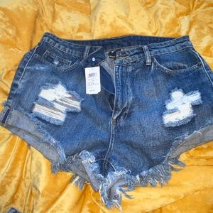 dark high rise distressed shorts